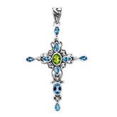 Sterling silver cross pendant with vibrant peridot center and sparkling blue topaz accents, handcrafted Balinese jewelry for faith-inspired style and gifting.